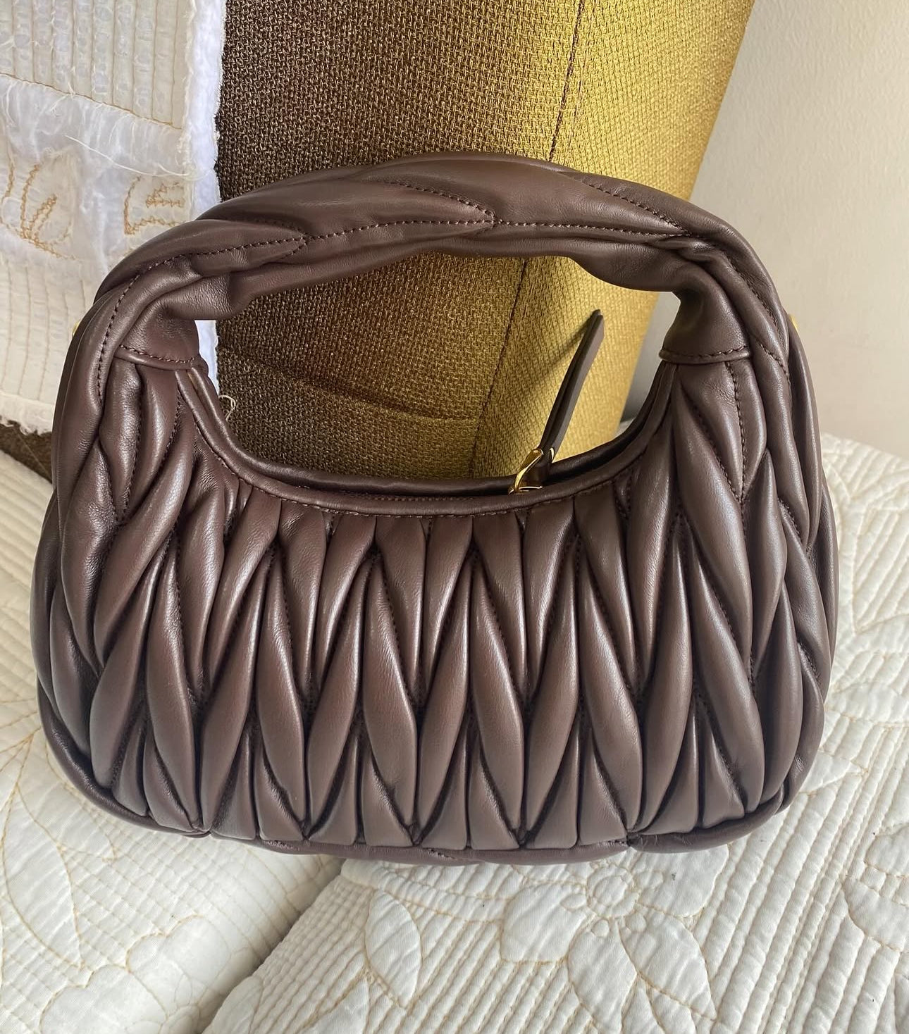 Wander matelassé nappa leather hobo bag | MIU