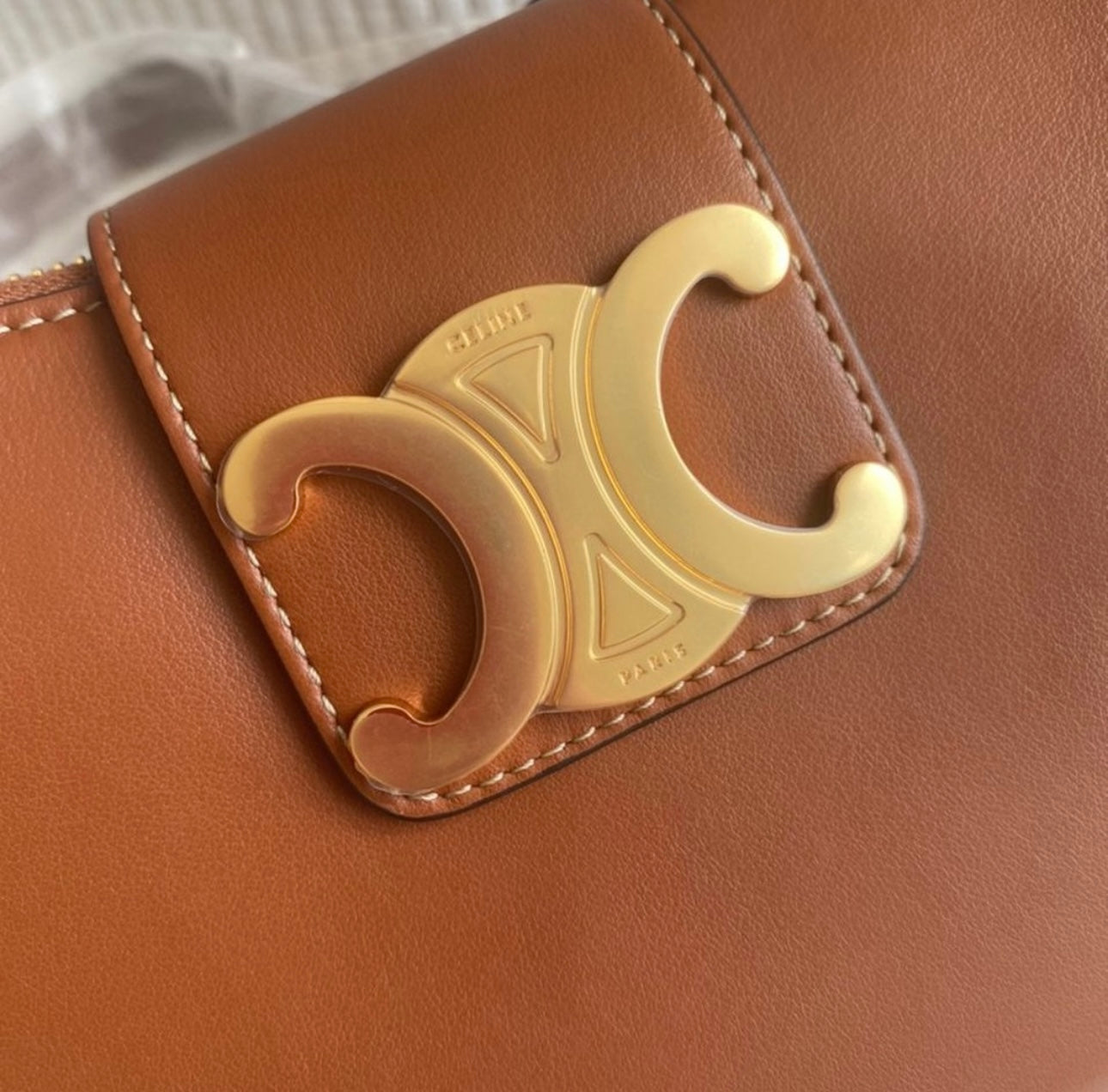 Tan Ava Triomphe bag in smooth calfskin