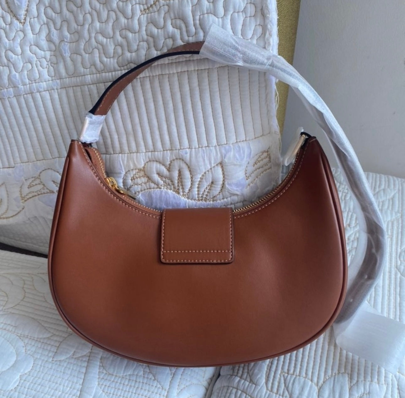 Tan Ava Triomphe bag in smooth calfskin