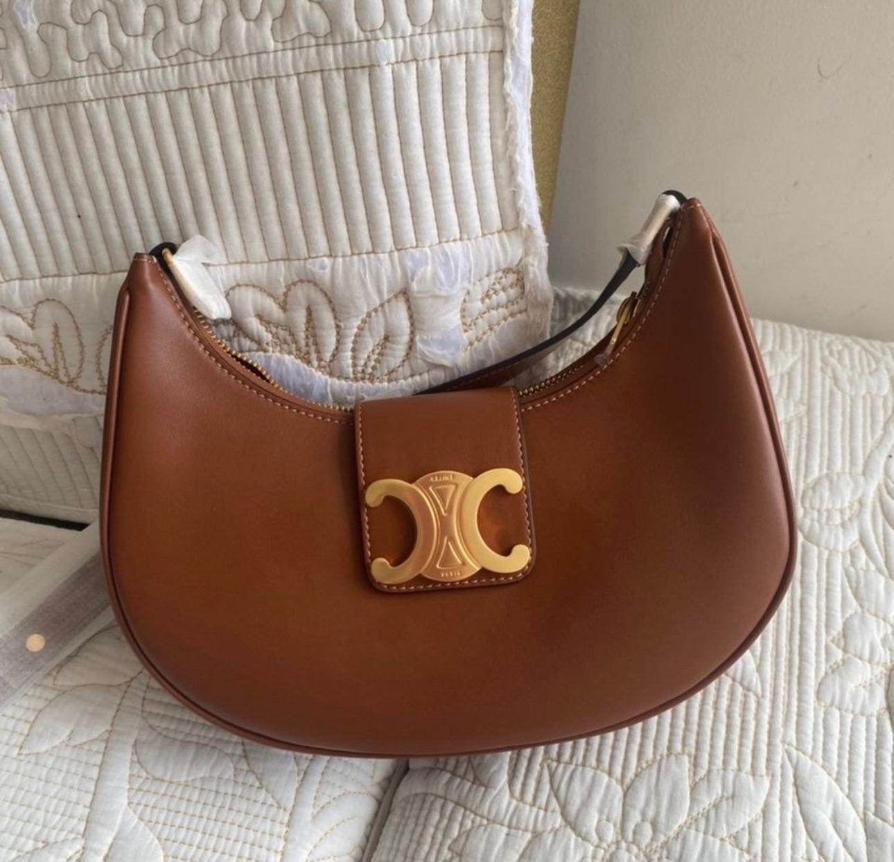 Tan Ava Triomphe bag in smooth calfskin