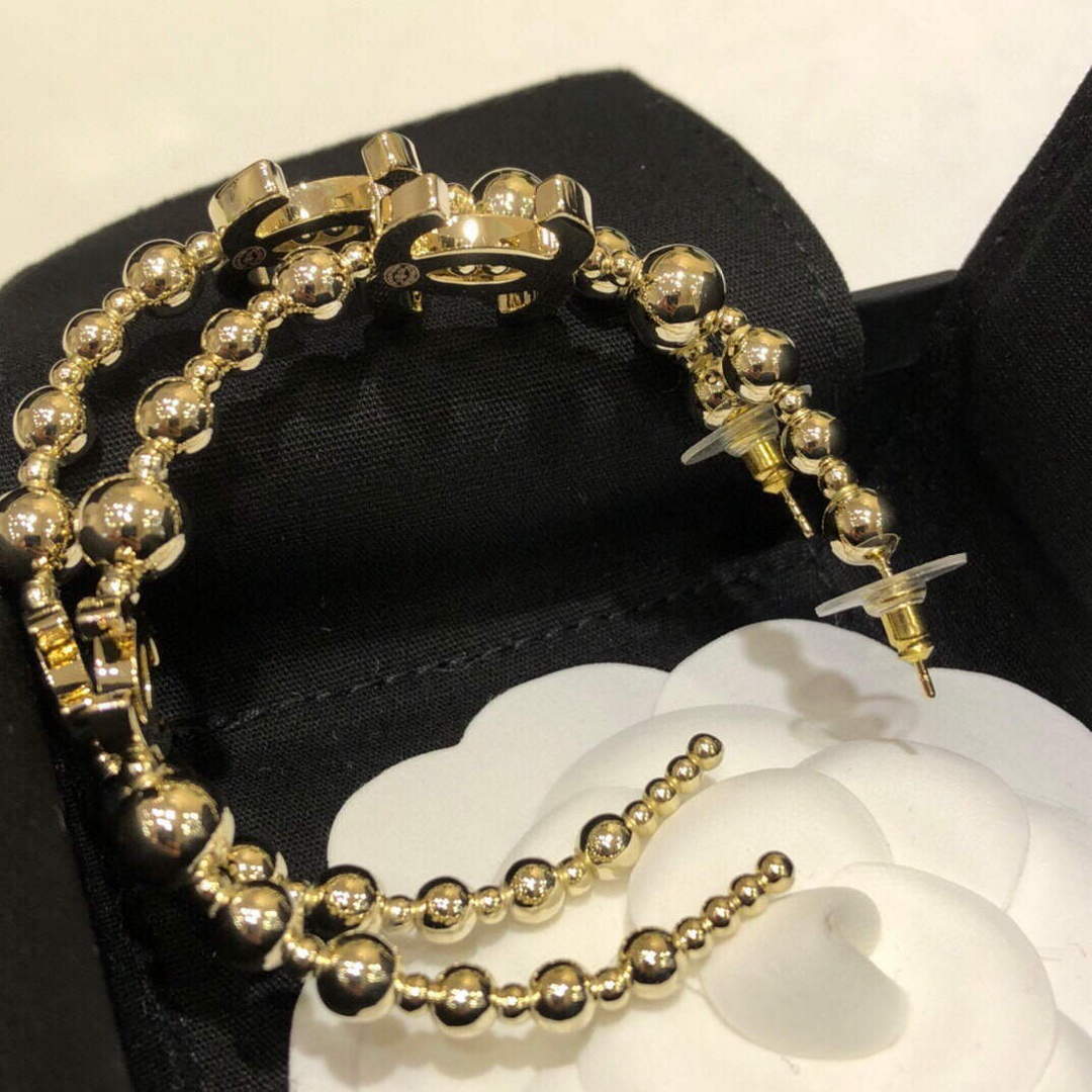Grandes boucles d'oreilles créoles Coco