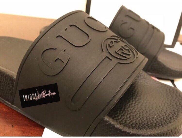 Claquettes en caoutchouc à logo GG