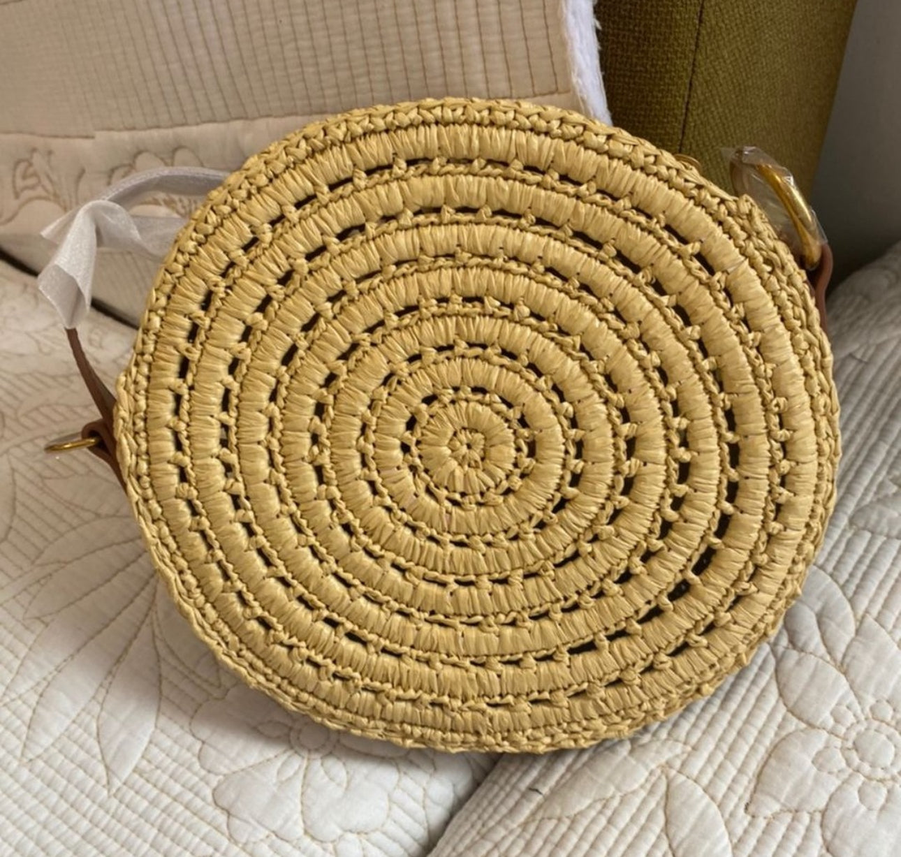 ROUND BAG IN RAFFIA AND VEGETABLE-TANNED LEATHER