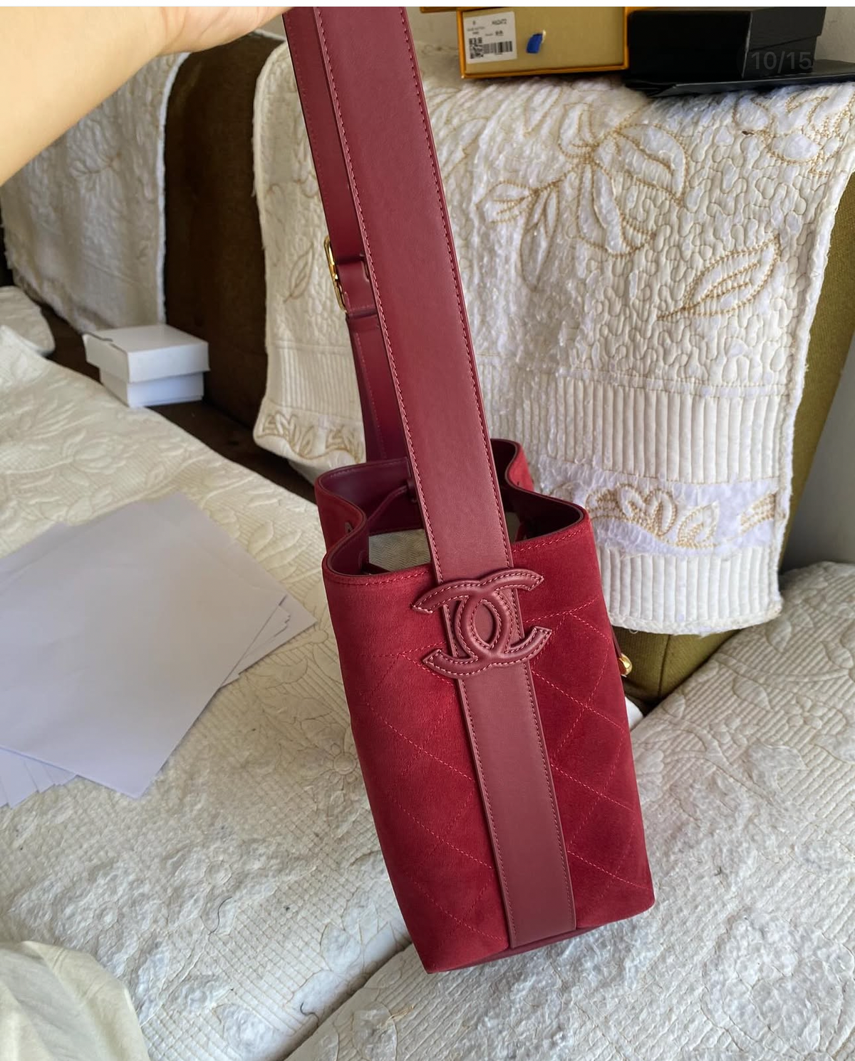 “CC Loop" Drawstring Bucket Bag in dark burgundy