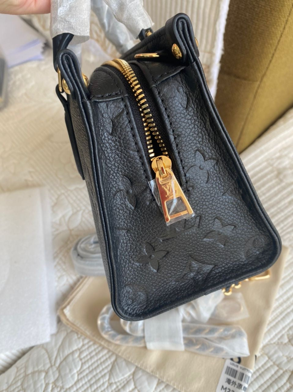 Black OnTheGo East West Monogram Empreinte Leather