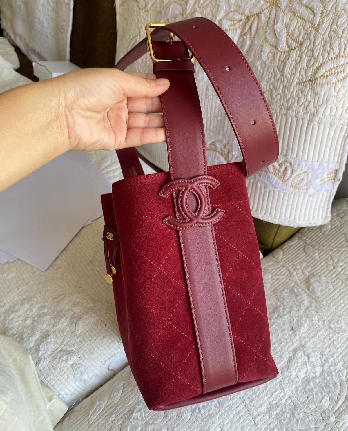 “CC Loop" Drawstring Bucket Bag in dark burgundy