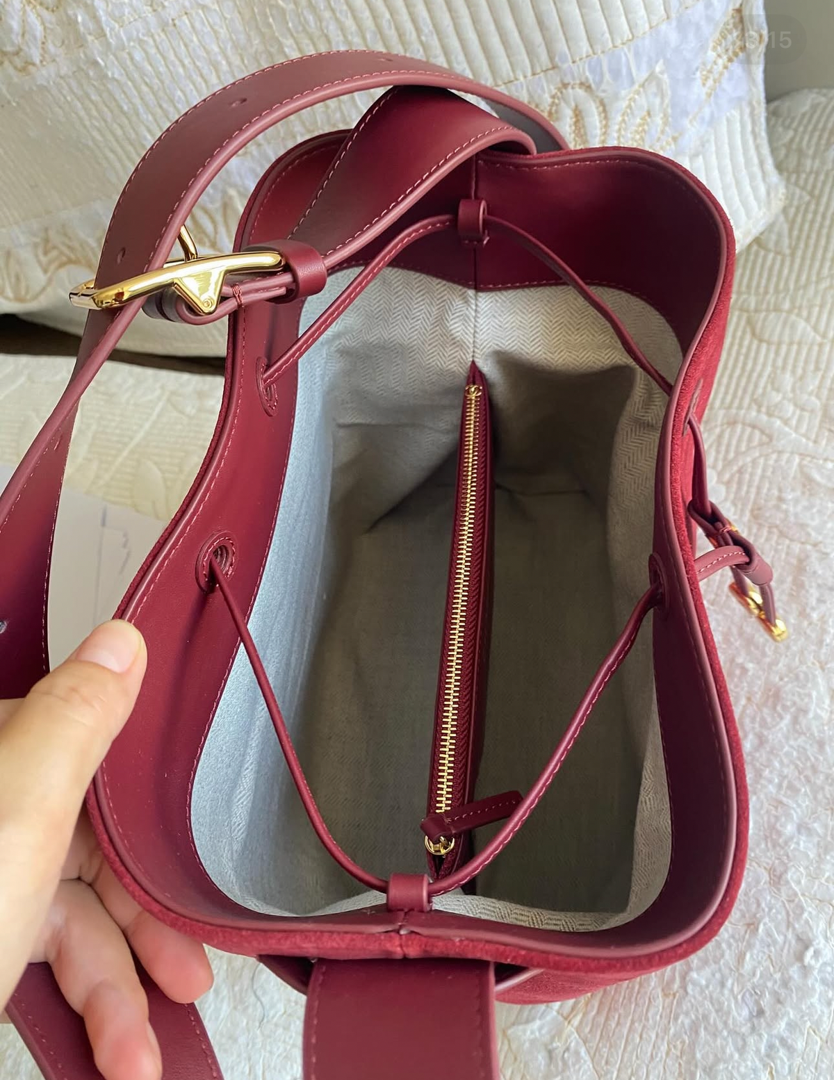 “CC Loop" Drawstring Bucket Bag in dark burgundy