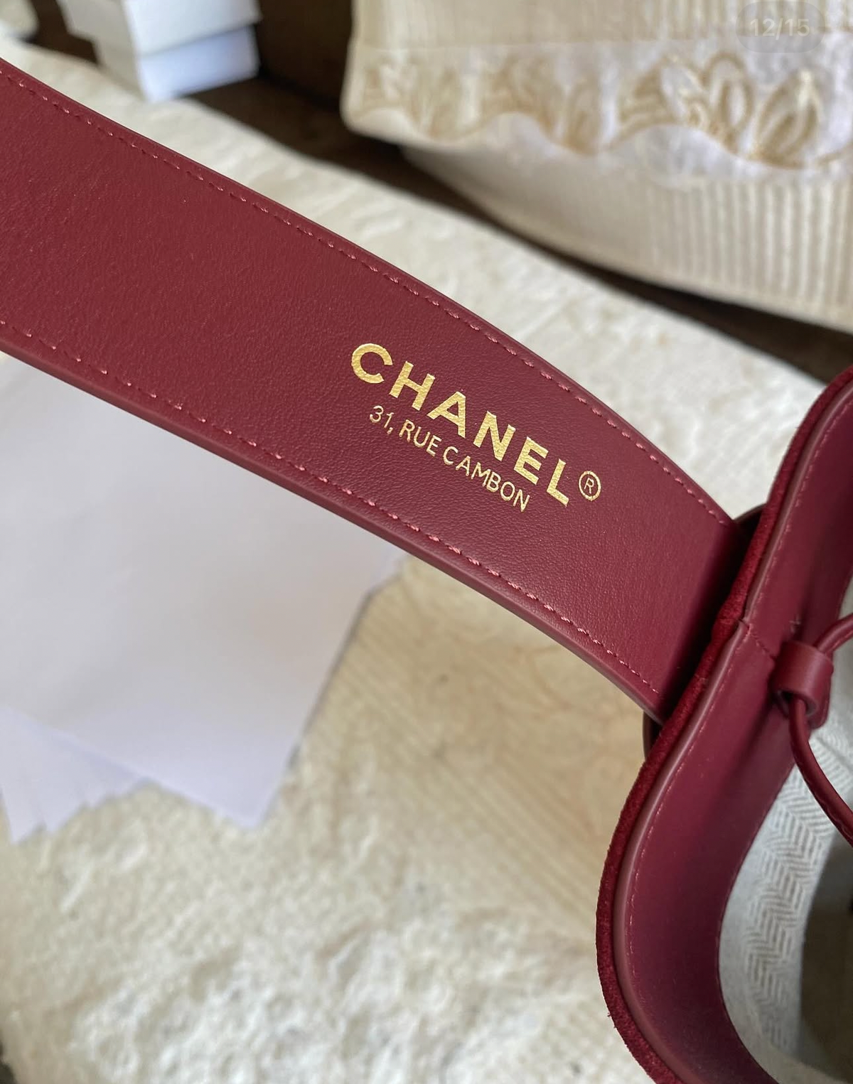“CC Loop" Drawstring Bucket Bag in dark burgundy