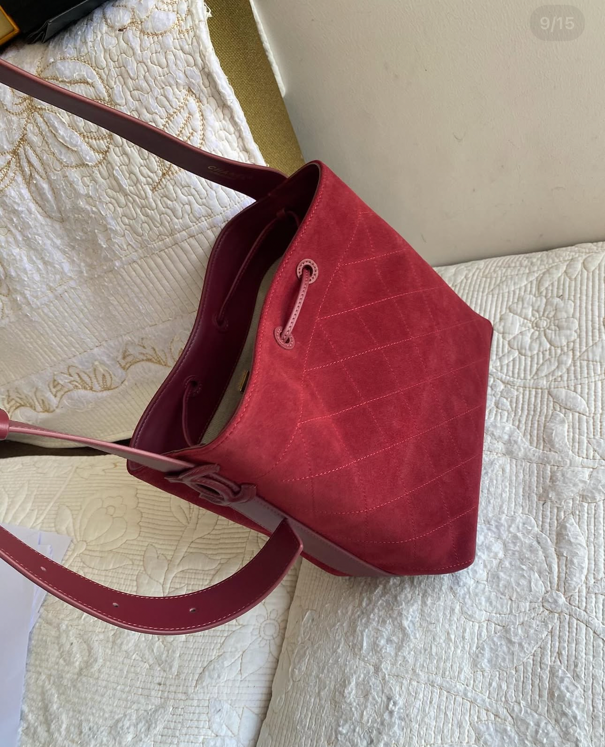 “CC Loop" Drawstring Bucket Bag in dark burgundy