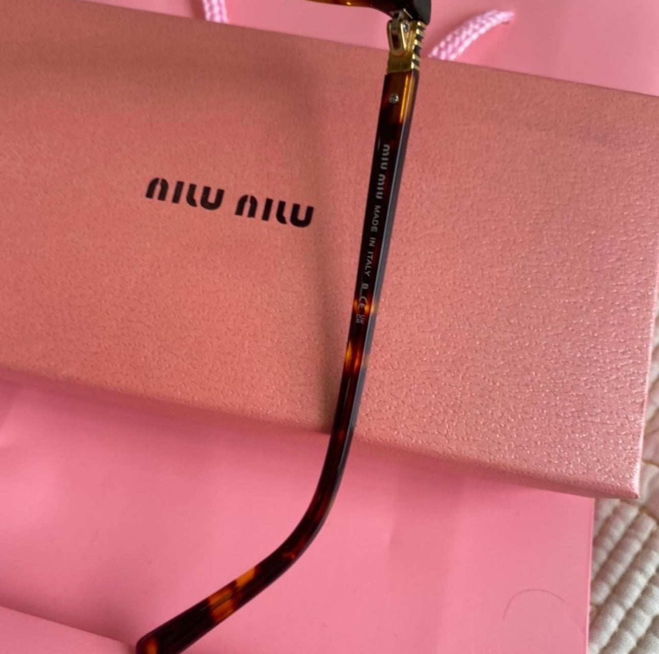 Regard Sunglasses | Miu Miu