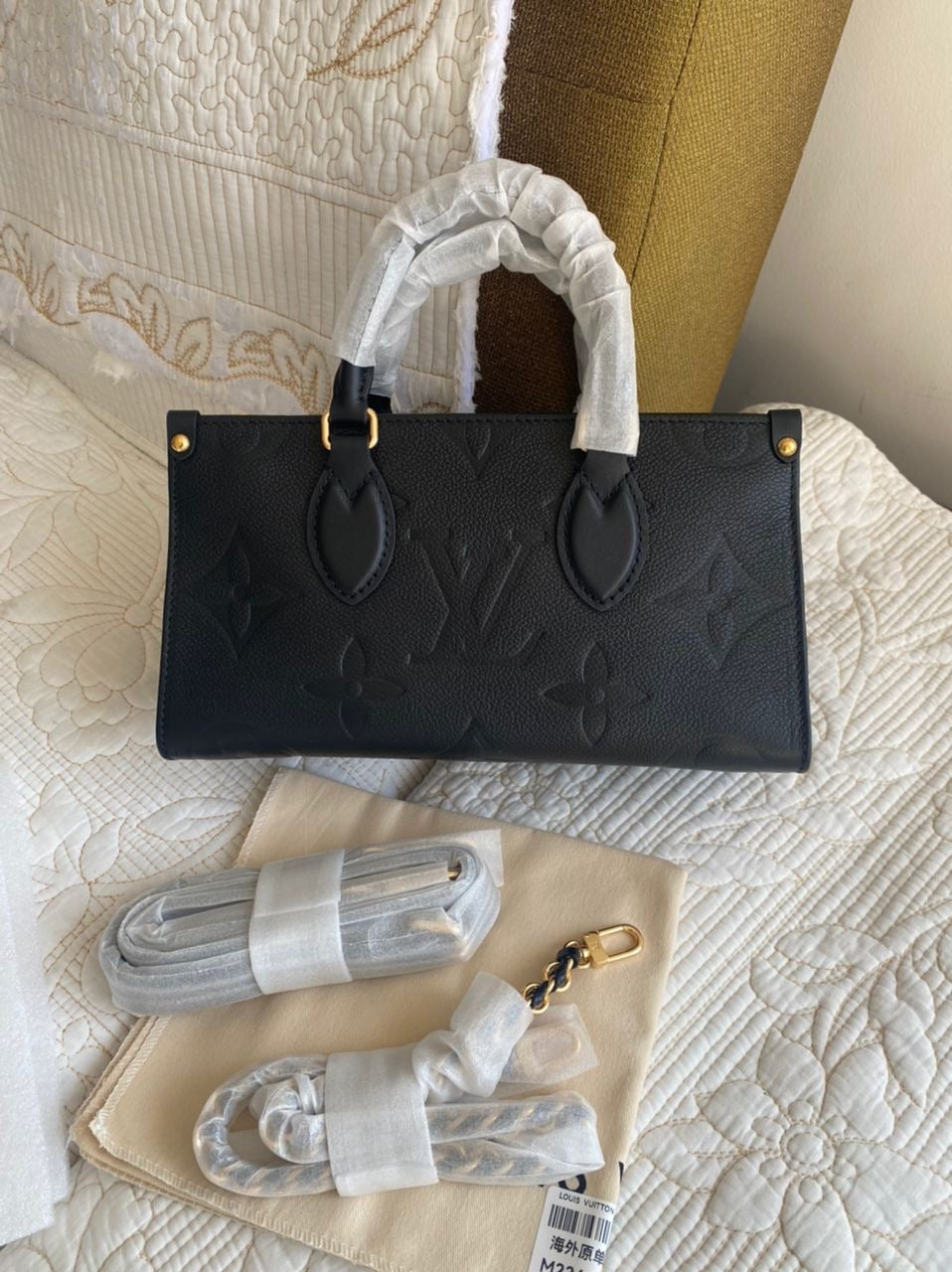 Black OnTheGo East West Monogram Empreinte Leather