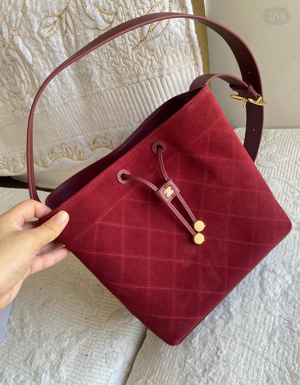 “CC Loop" Drawstring Bucket Bag in dark burgundy