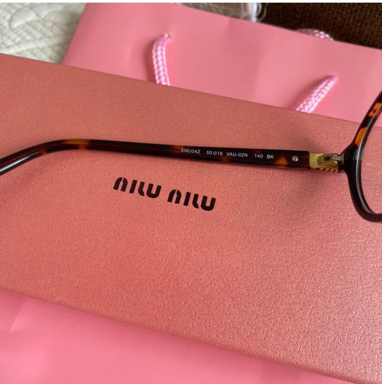 Regard Sunglasses | Miu Miu