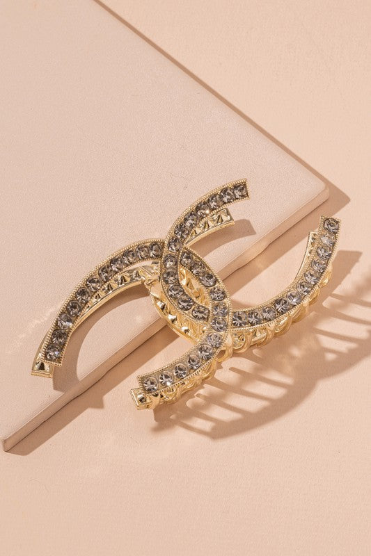 Griffe de cheveux croisée en strass Double C